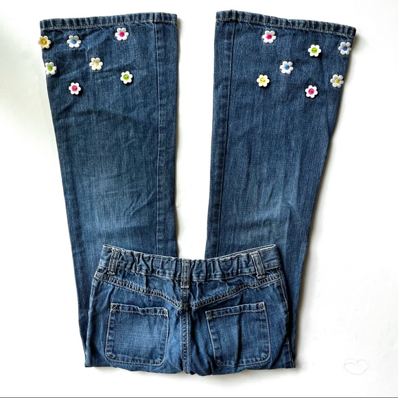 Jean bleu foncé à broderies fleurs Fille